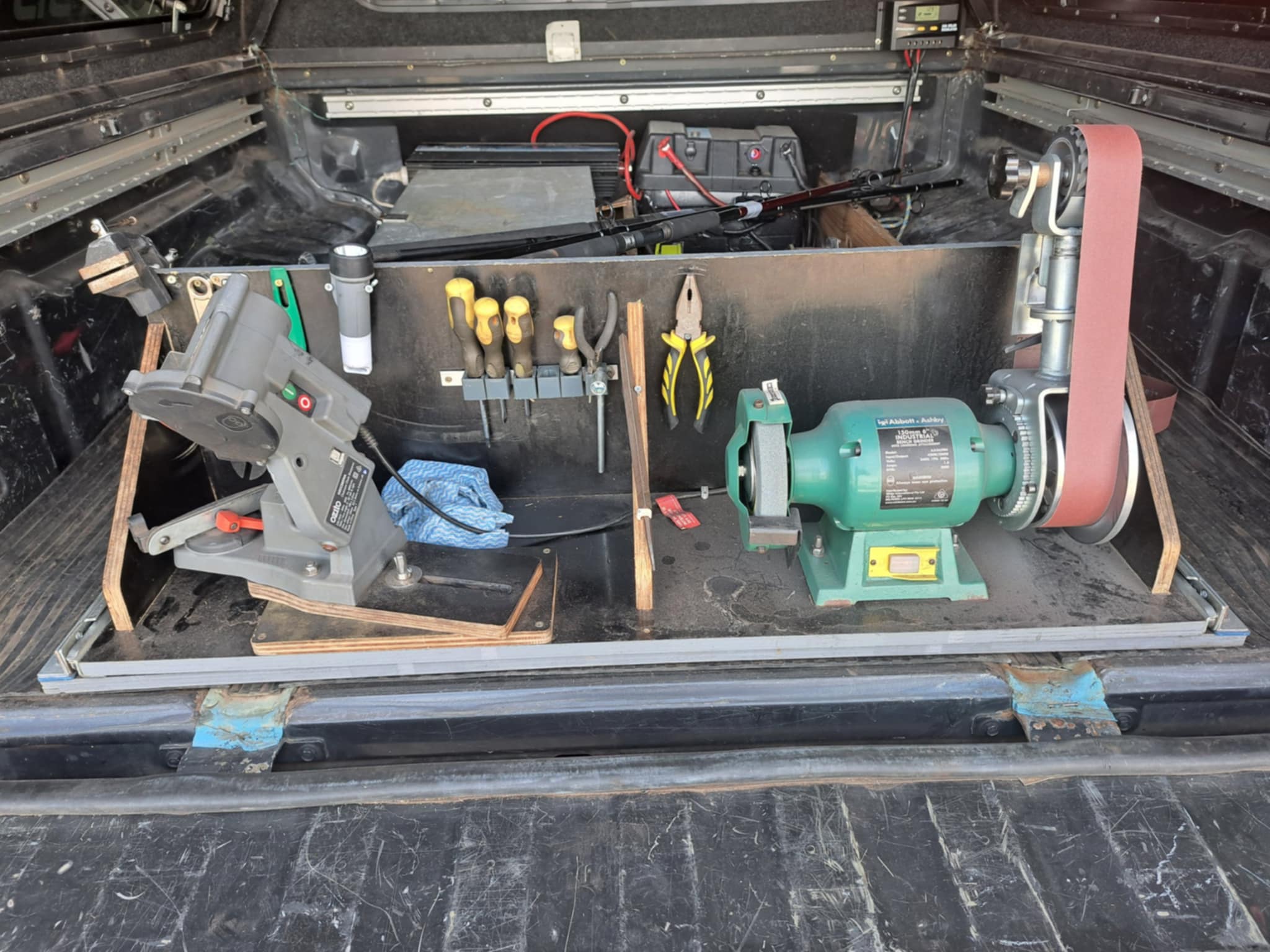 Sharpening equipment and tools setup inside AMSS mobile service vehicle